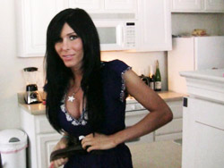 Young Kimber James wearing a black sexy shotrs dress and black high-heeled shoes,TS Kimber likes jerking and bowjob.
